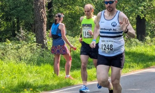 Owain giving a wave during the Trail 10k race